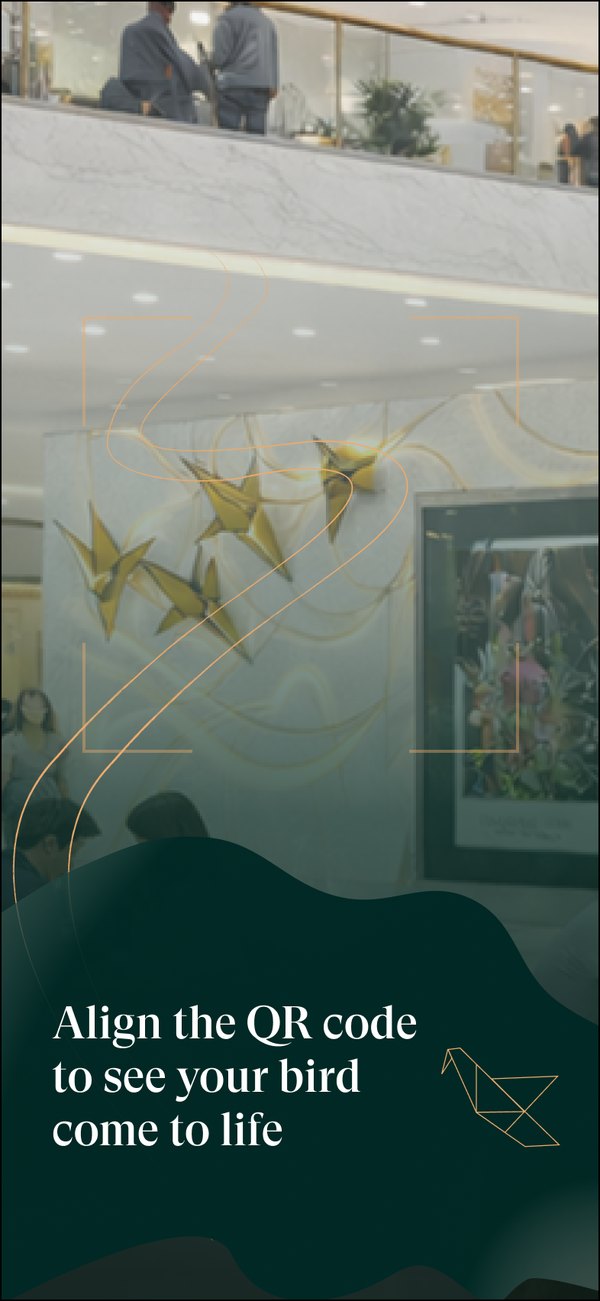 The screen instructing visitors to hold the QR code in frame